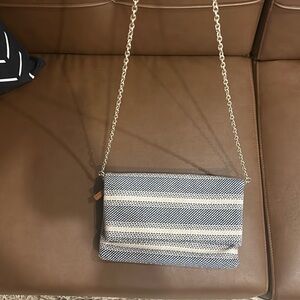 Striped folding clutch with organized pockets